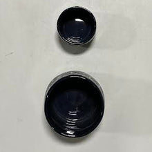 Load image into Gallery viewer, Two Black Starry Planter bowls, with a hand-painted look, are arranged on a white surface— the small bowl above the larger one, both viewed from above.