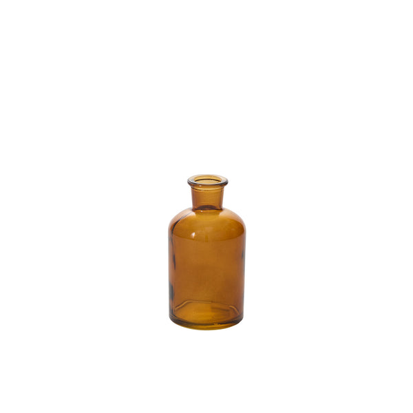 A translucent amber bud vase with a short neck and wide base is displayed against a plain white background.