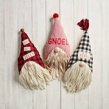 Load image into Gallery viewer, Three festive gnomes with yarn beards and hats reading LET'S GET JOLLY!, NOEL, and OH SO MERRY sit on a white wooden background—the perfect companions for your Gnoel Gnome Pillow.