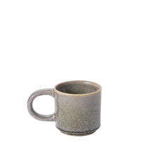 Load image into Gallery viewer, The Starling Mug Collection features a ceramic coffee mug with a large handle, speckled grayish-green reactive glaze, and a slightly darker base, highlighting artisanal tableware against a plain white background.