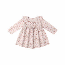 Load image into Gallery viewer, The Ruffle Collar Jersey Dress is a long-sleeved, light pink baby dress featuring a ruffled collar and garden print in muted pink and brown, crafted from soft organic cotton. Displayed against a white background.