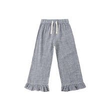 Load image into Gallery viewer, The Wide Leg Ruffle Pant features a blue and white marine gingham print, an elastic waistband with white drawstring, and a delicate ruffle hem, shown laid flat on a white background.