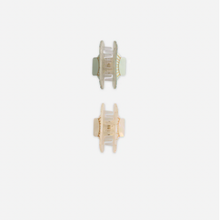 Load image into Gallery viewer, The Shell Clip Set - Seafoam/Natural features two small, translucent rectangular hair claws in soft sage green and light beige, displayed vertically on a white background for an easy coastal summer vibe.