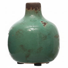 Load image into Gallery viewer, The Terracotta Mini Vase is a handcrafted, rounded green piece with a narrow neck, brown rim, crackled glaze, and brown patches. It stands on three feet and brings a vintage touch to any farmhouse décor.