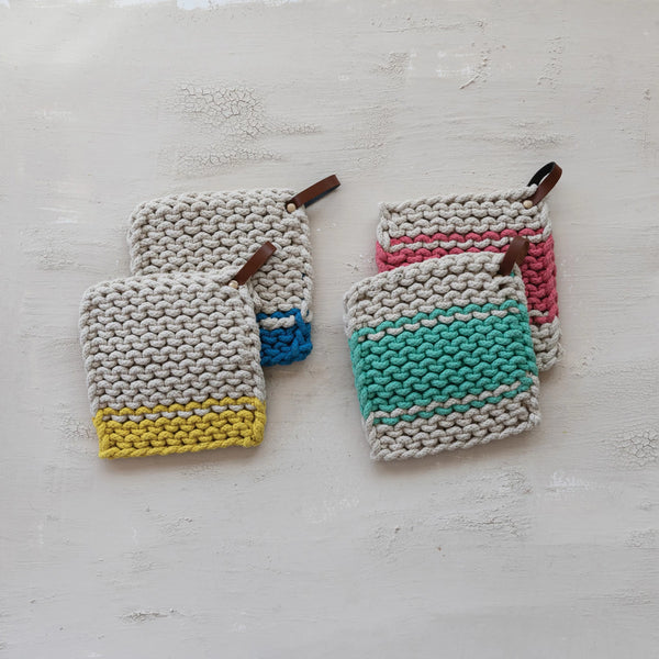 Set of four Crocheted Pot Holders with leather straps in blue, yellow, pink, and teal stripes. Use as decorative kitchen heat protection or unique handcrafted cotton coasters. Product Name: Crocheted Pot Holder w/ Leather Strap, 4 Styles.