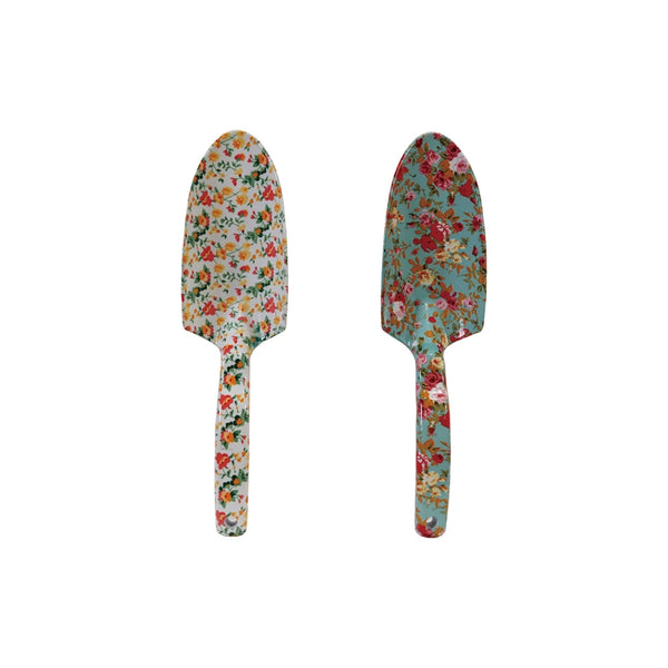 Creative Co-Ops Flowered Garden Tools: 2 Styles feature aluminum designs with colorful floral patterns—one white, one teal—perfect for brightening your gardening routine. Both tools are shown side by side on a white surface.