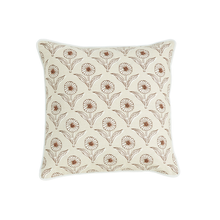 Load image into Gallery viewer, Mudpies Block Print Flower Knot Pillow, available in 2 styles, features a square beige design with a repeating brown floral pattern and elegant white piping, displayed on a plain white background.