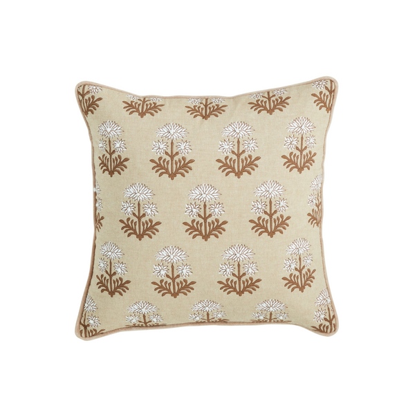 The Mudpie Block Print Flower Knot Pillow features a beige background with brown and white floral motifs, brown edge piping, and is available in 2 styles.